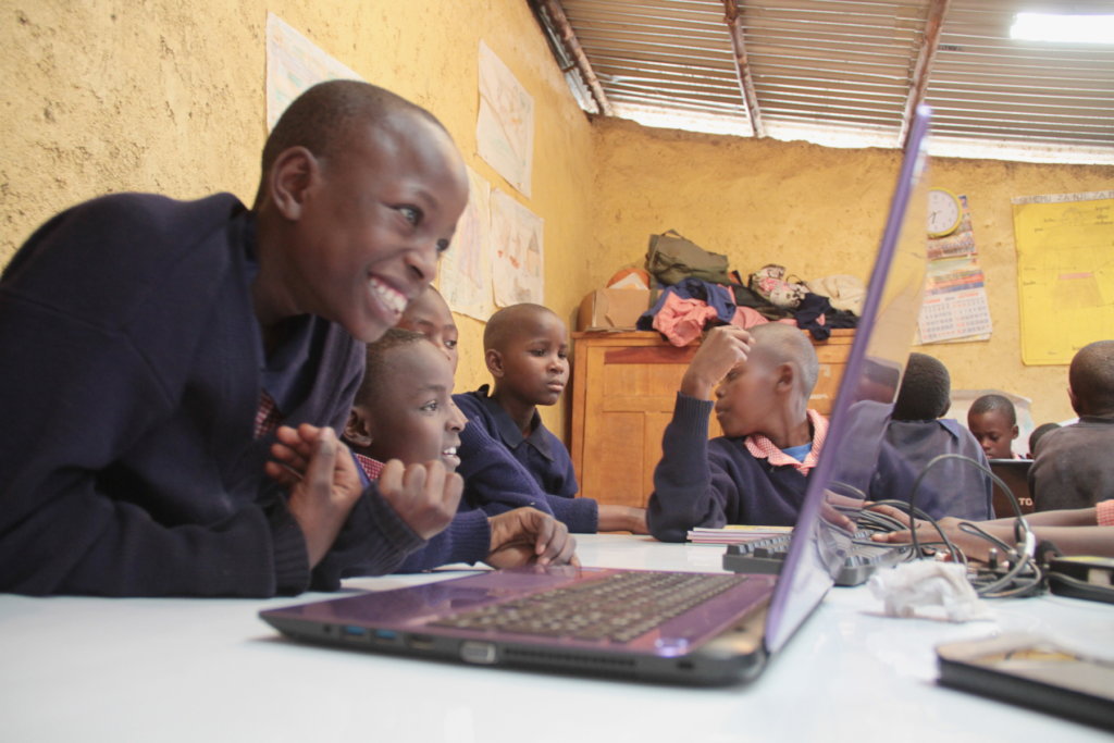 Ugandan student learning ICT